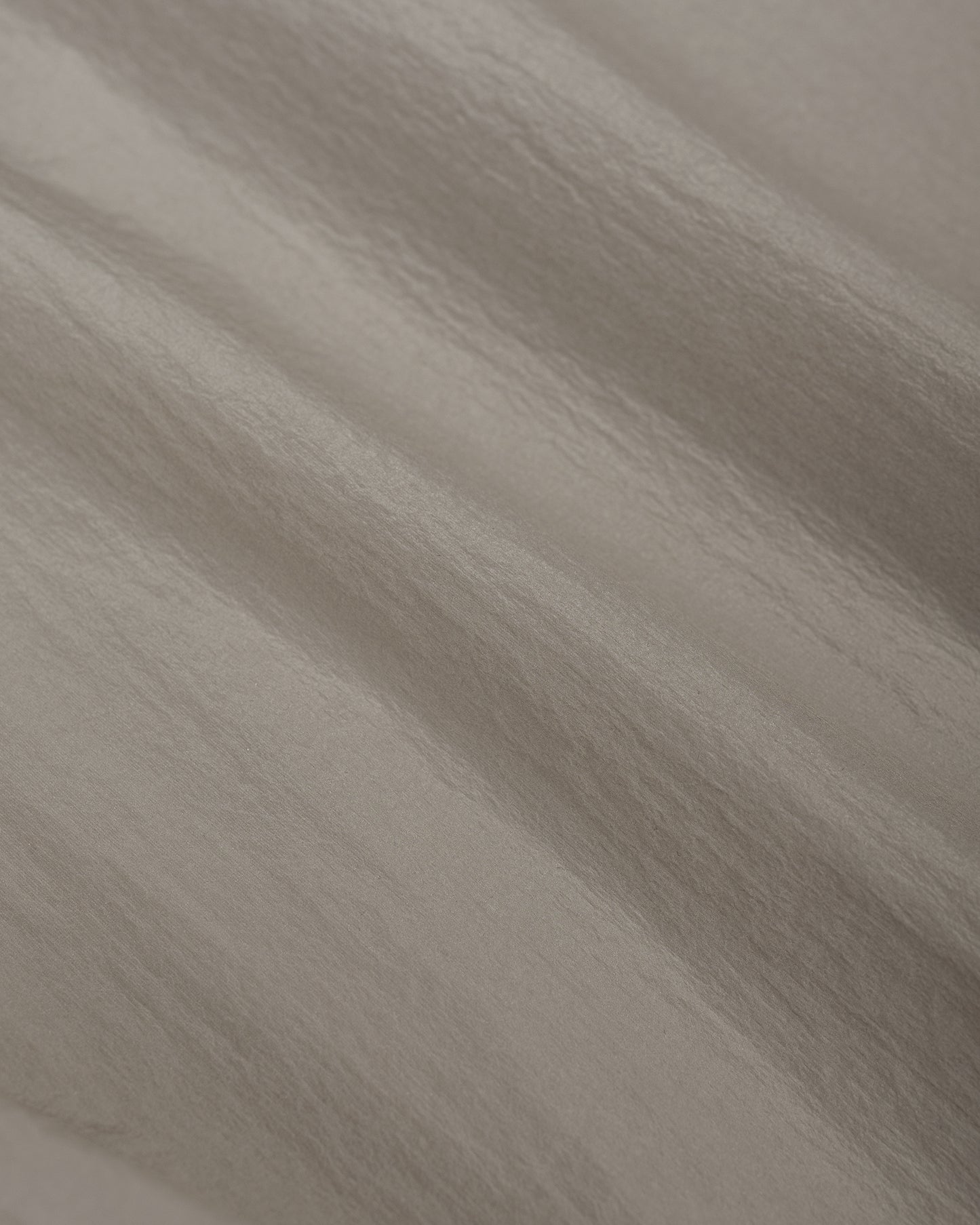 lost & found Goldwin Goldwin Sheer Nylon Wind Jacket Arid Beige