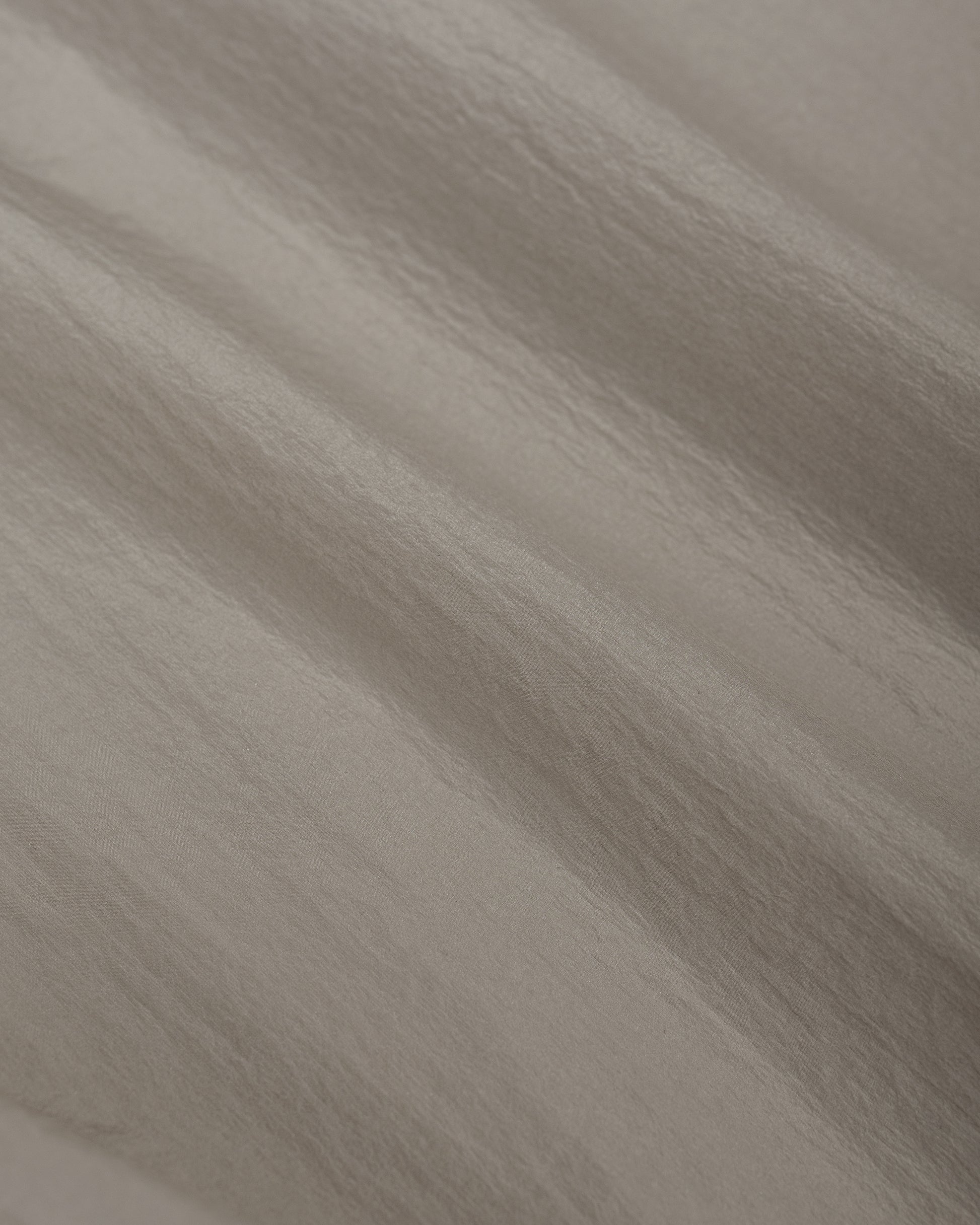 lost & found Goldwin Goldwin Sheer Nylon Wind Jacket Arid Beige